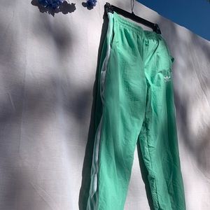 Adidas teal windbreakers size S pants